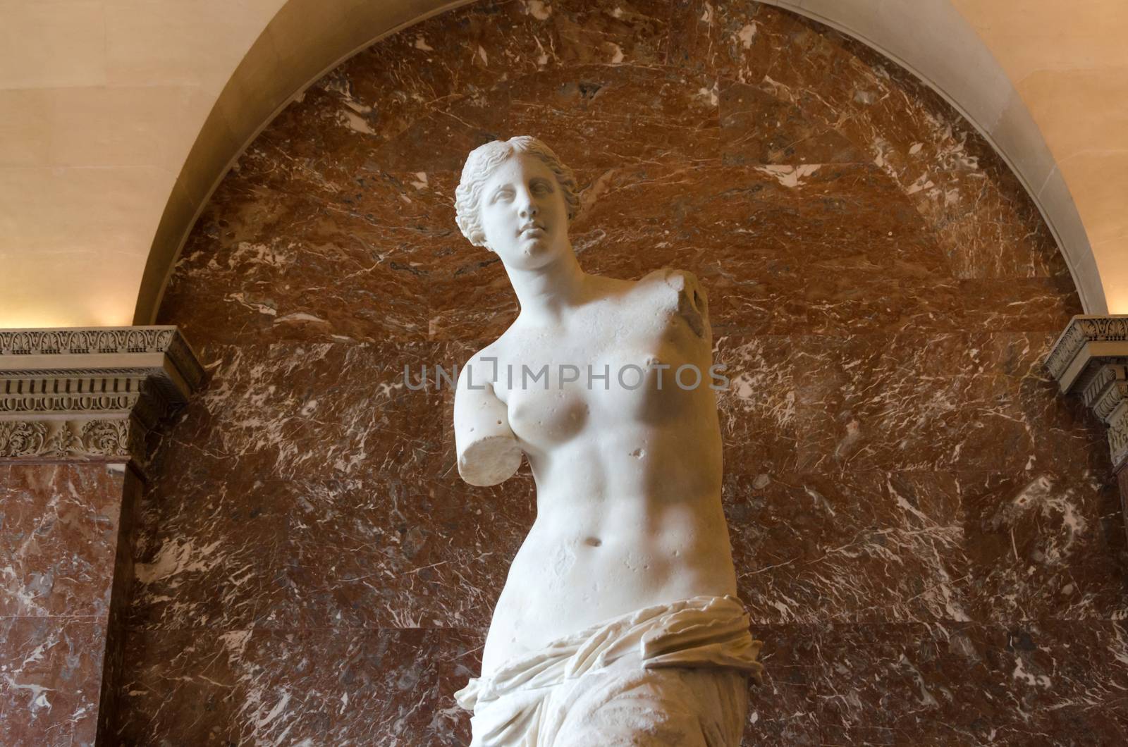 Paris, France - May 13, 2015: The Venus de Milo statue at the Louvre Museum by siraanamwong