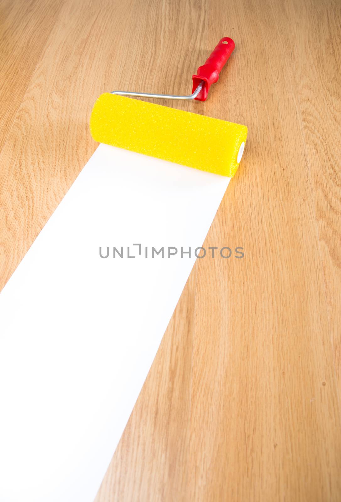 Paint roller with white copyspace by stokkete