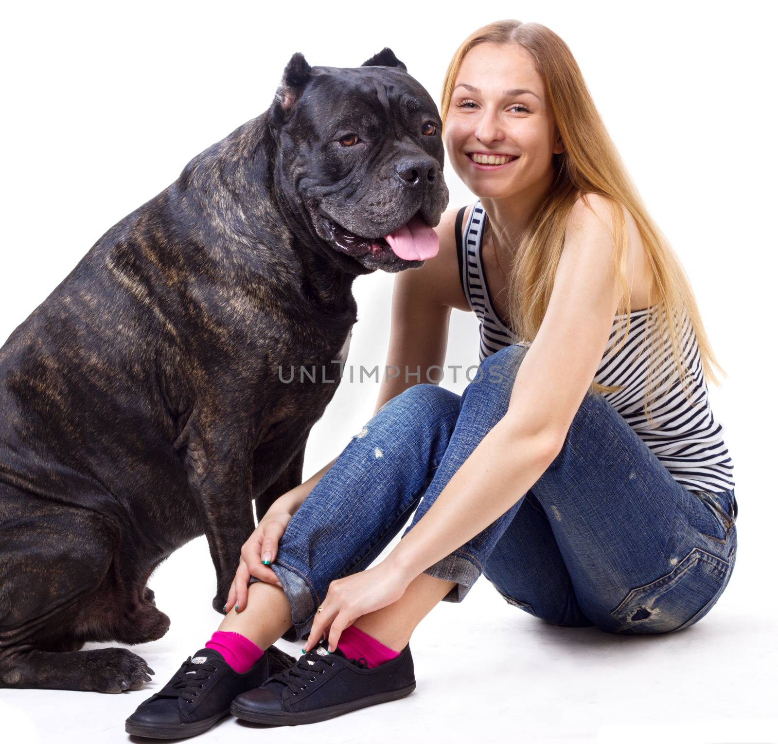 girl sitting and smile  next to his dog Cane Corso. isolate. square crop