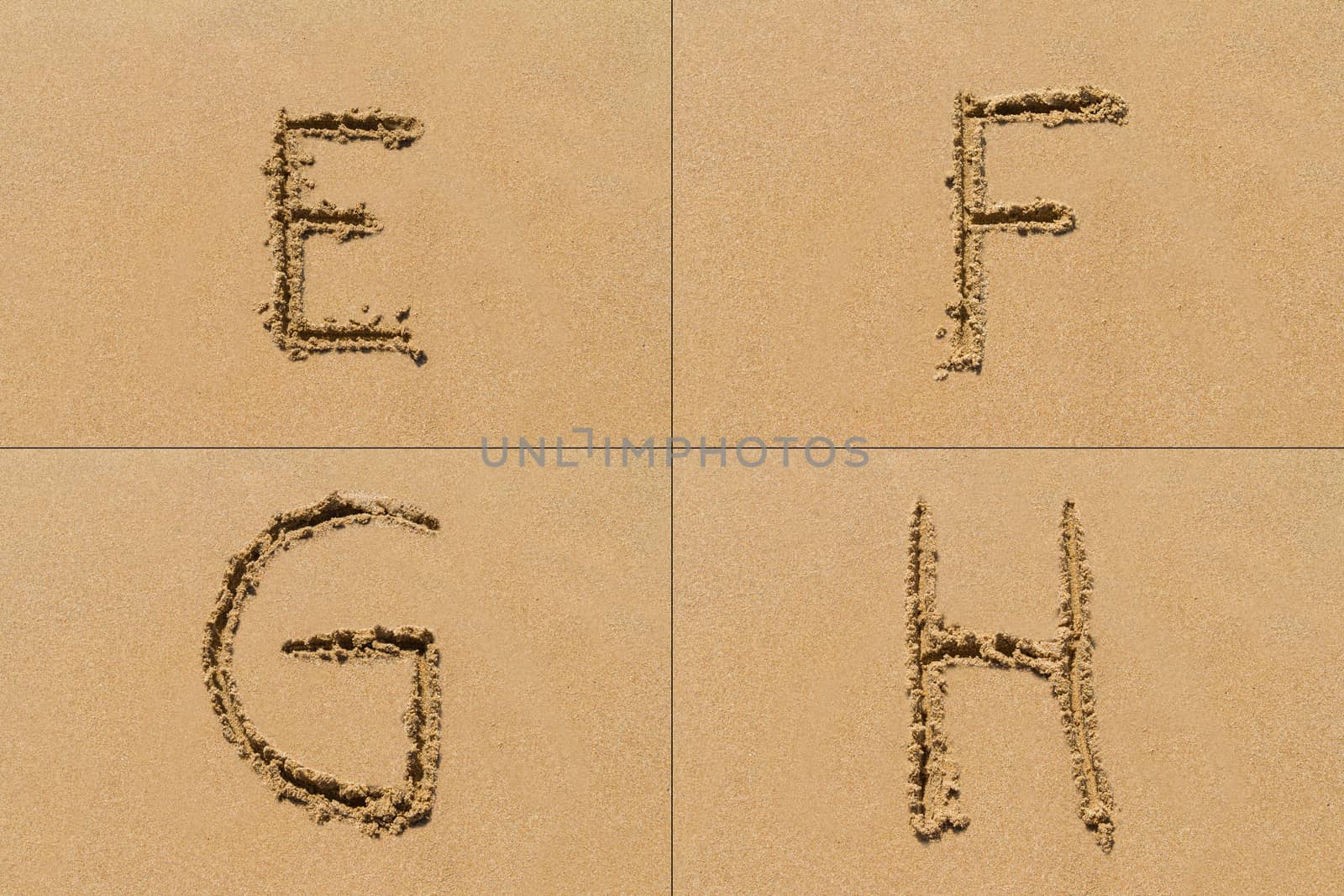 Conceptual set of E F G H letter of the alphabet written on sand with upper case.
