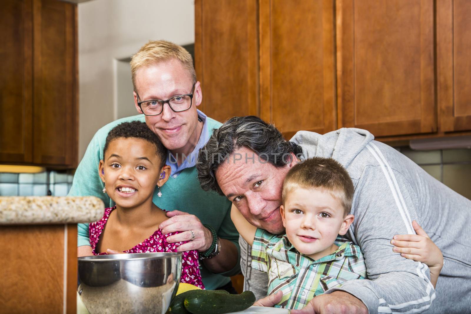 Gay with their kids in a residential kitchen