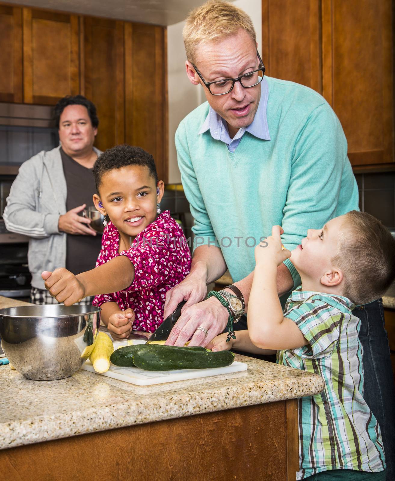 Same Sex Couple with Kids in Kitchen by Creatista