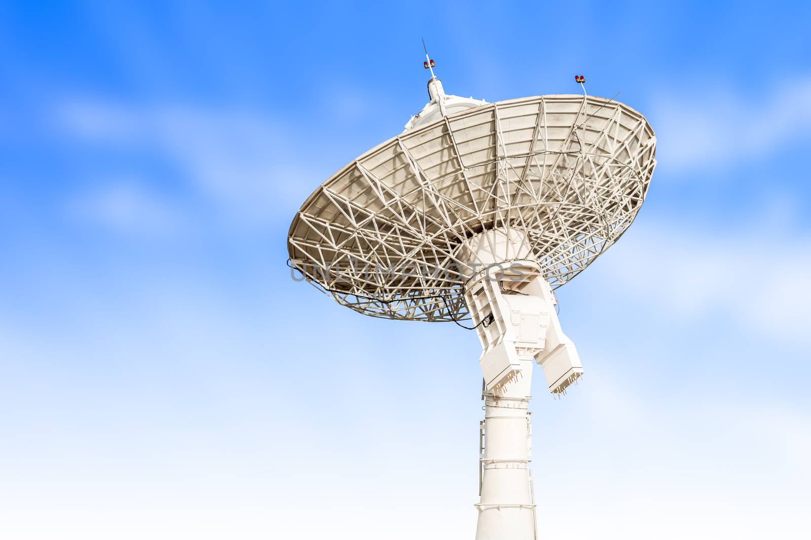 satellite dish antenna radar big size isolated on blue sky backg by FrameAngel