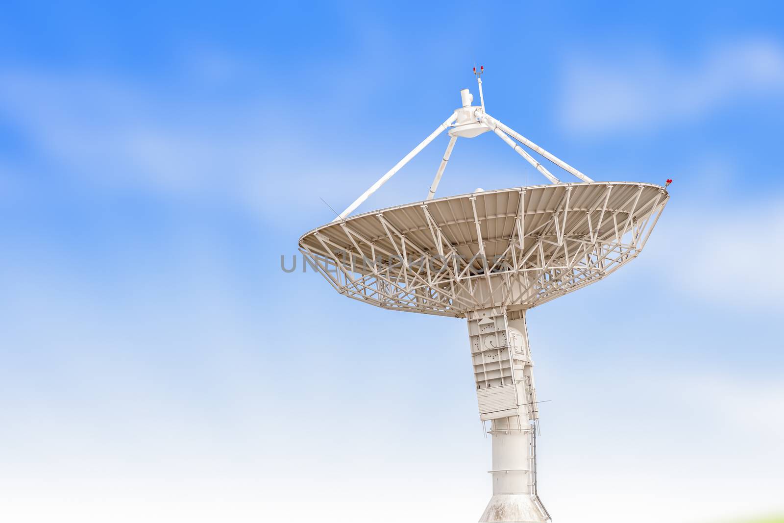 satellite dish antenna radar big size isolated on blue sky backg by FrameAngel