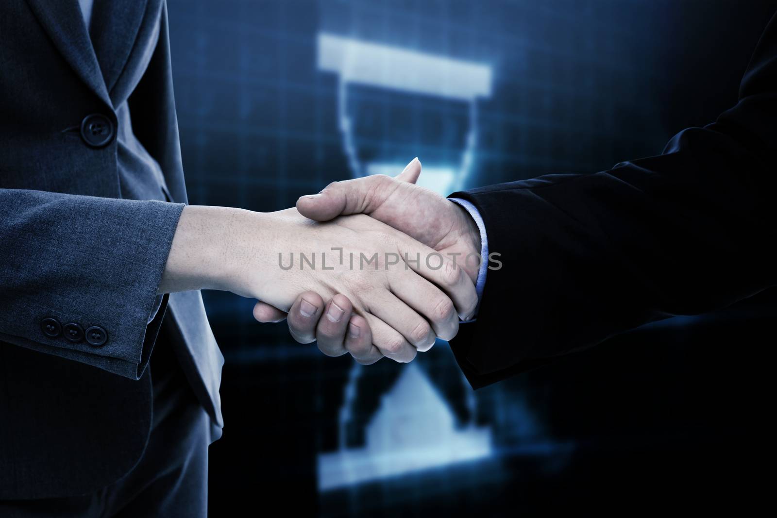 Composite image of close up of two businesspeople shaking their hands by Wavebreakmedia