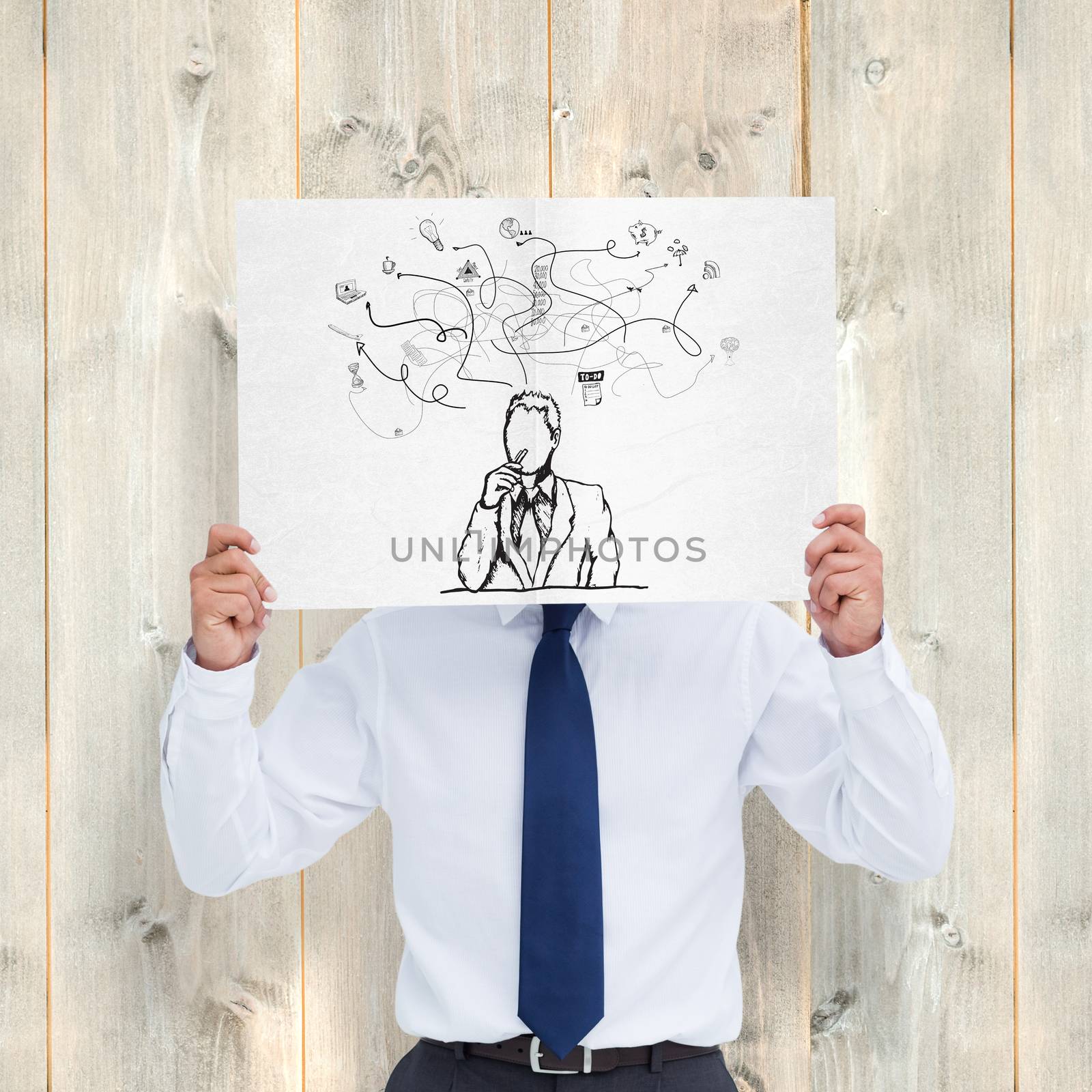 Composite image of tradesman holding blank sign in front of his head by Wavebreakmedia