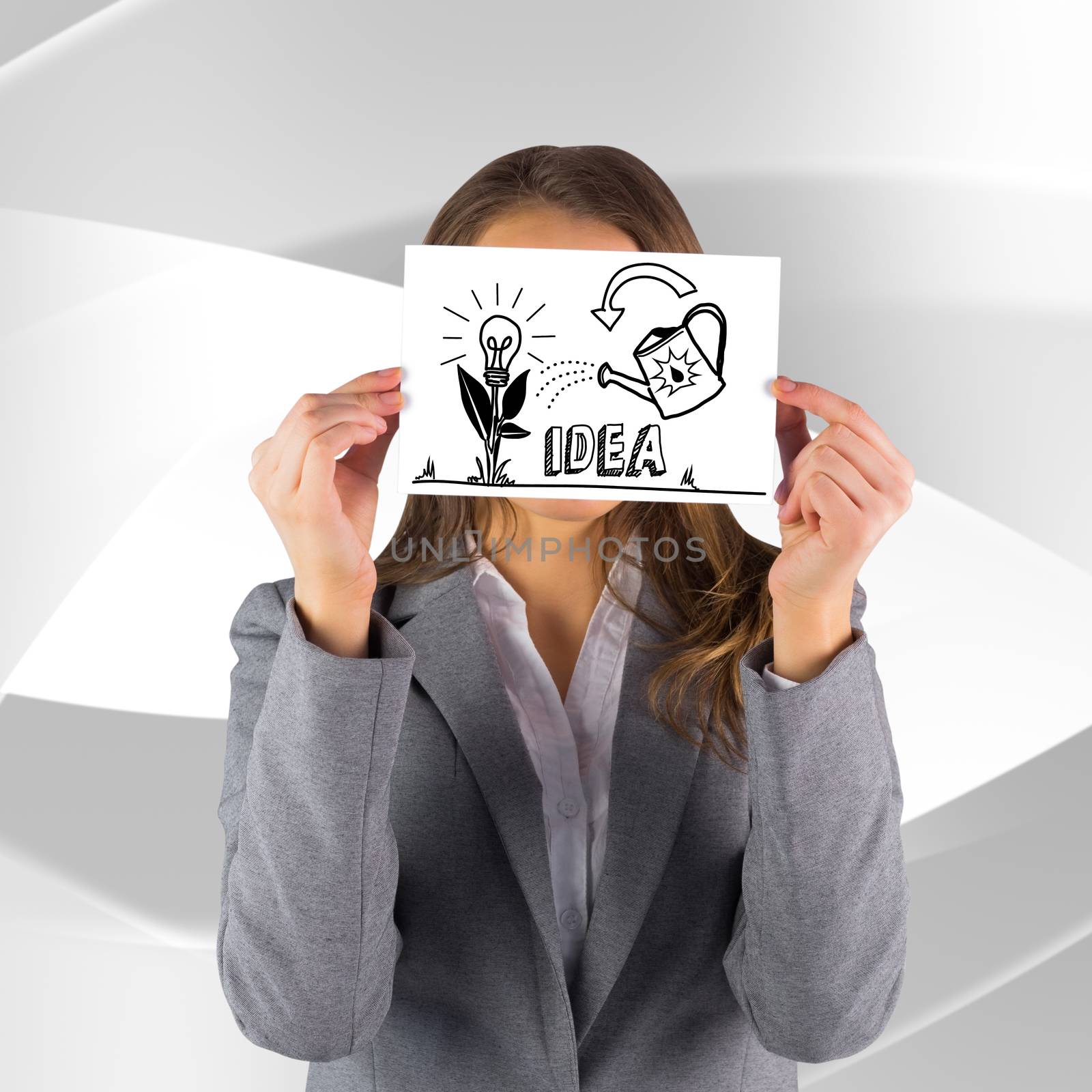 Composite image of businesswoman showing a card by Wavebreakmedia