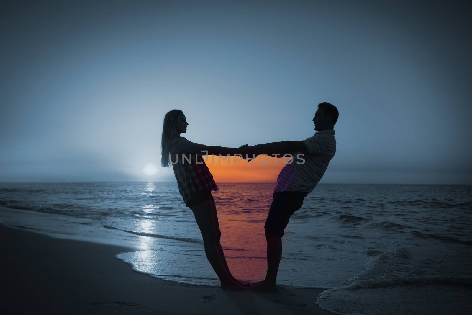 Composite image of couple holding hands on balcony by Wavebreakmedia