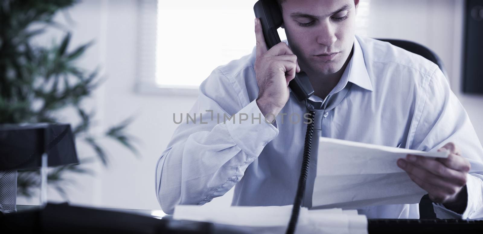 Young businessman calling the author of a letter