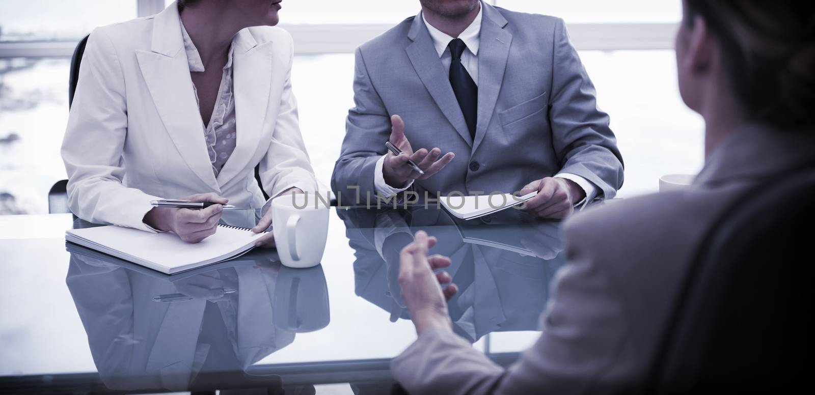 Business partners talking with their lawyer