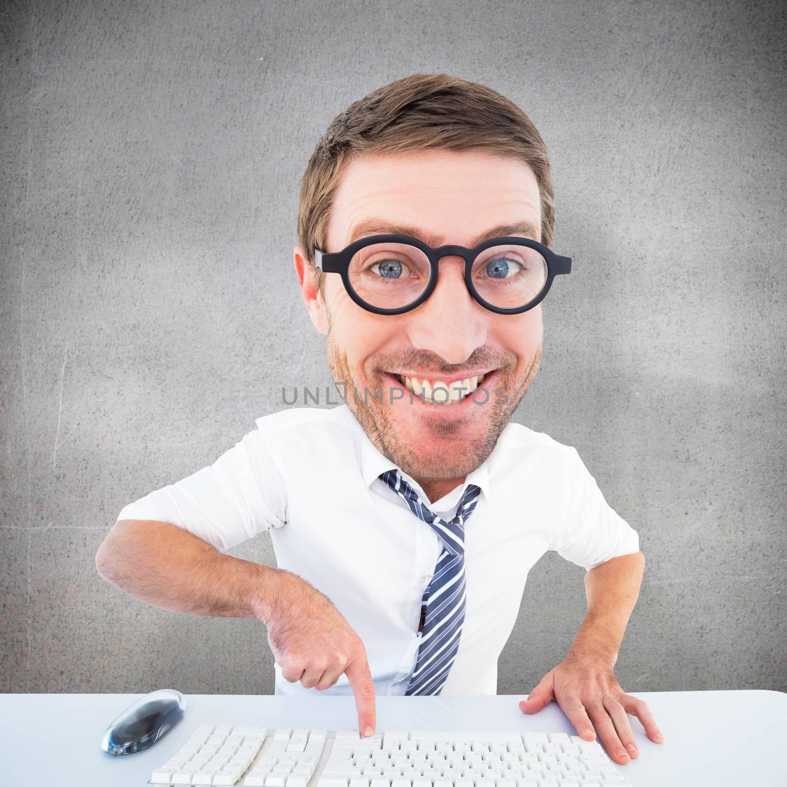 Geeky businessman typing against grey room