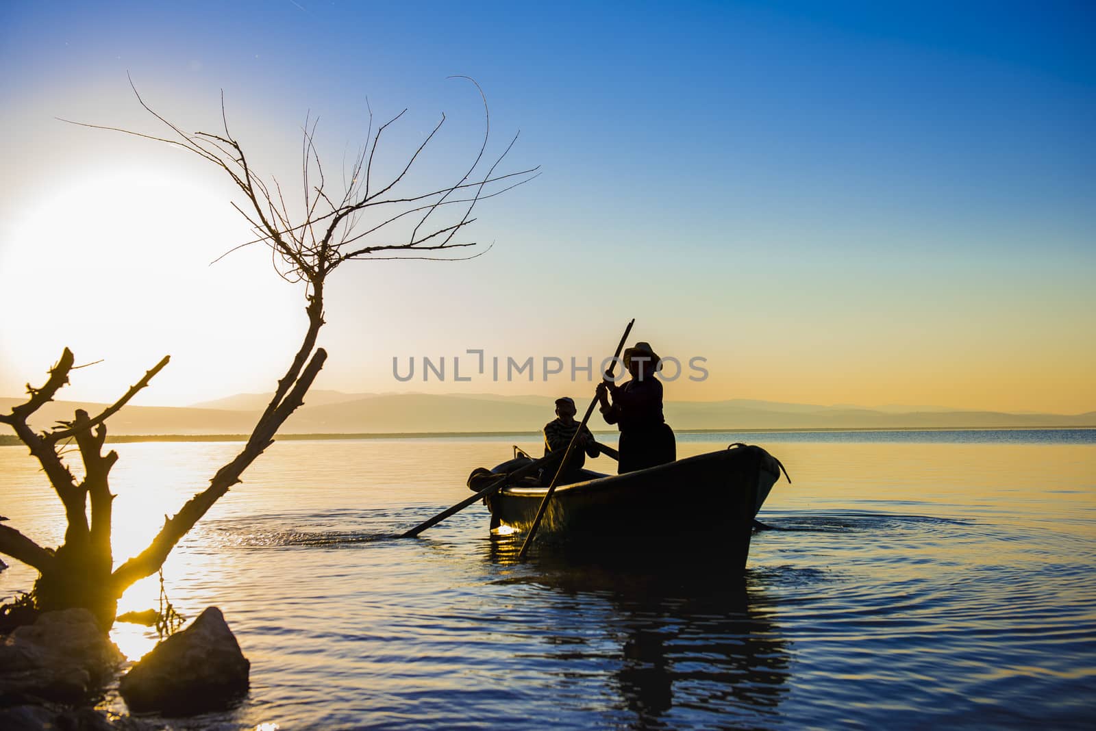 fishing family and sunrise by crazymedia007