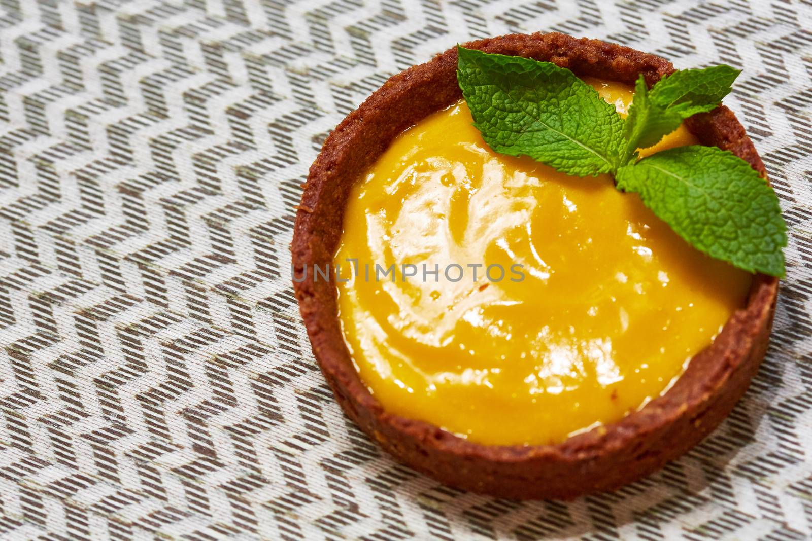 Sweet tartlets filled with cream. With copy space