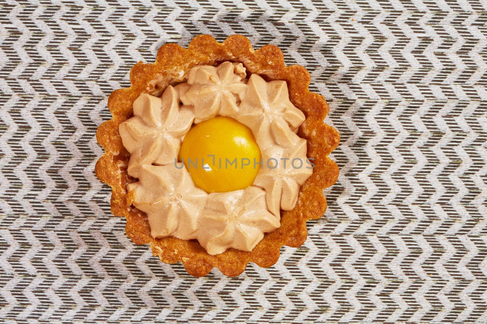 Sweet tartlets filled with cream. With copy space