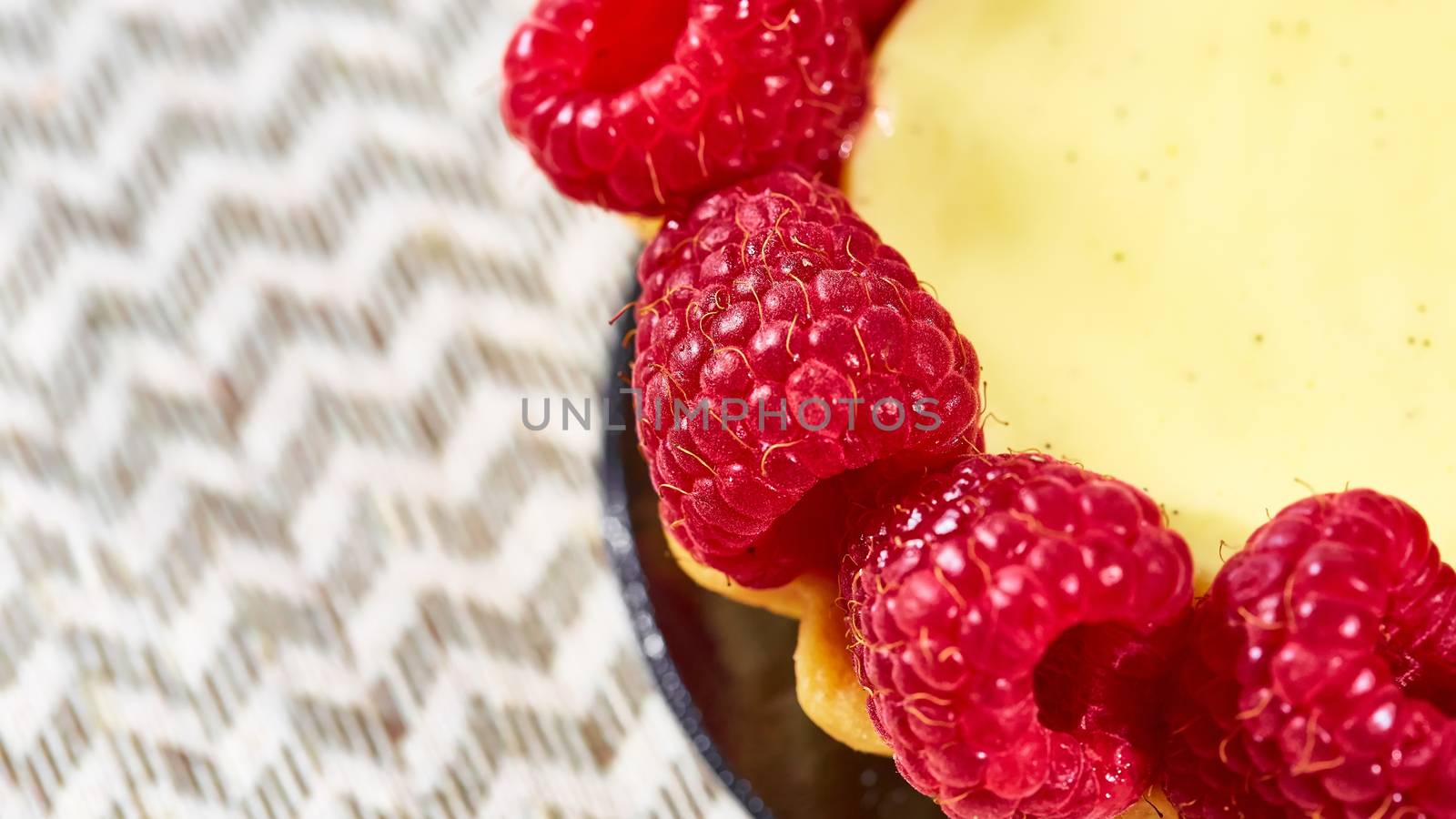 Home made tartlets with raspberries. With copy space