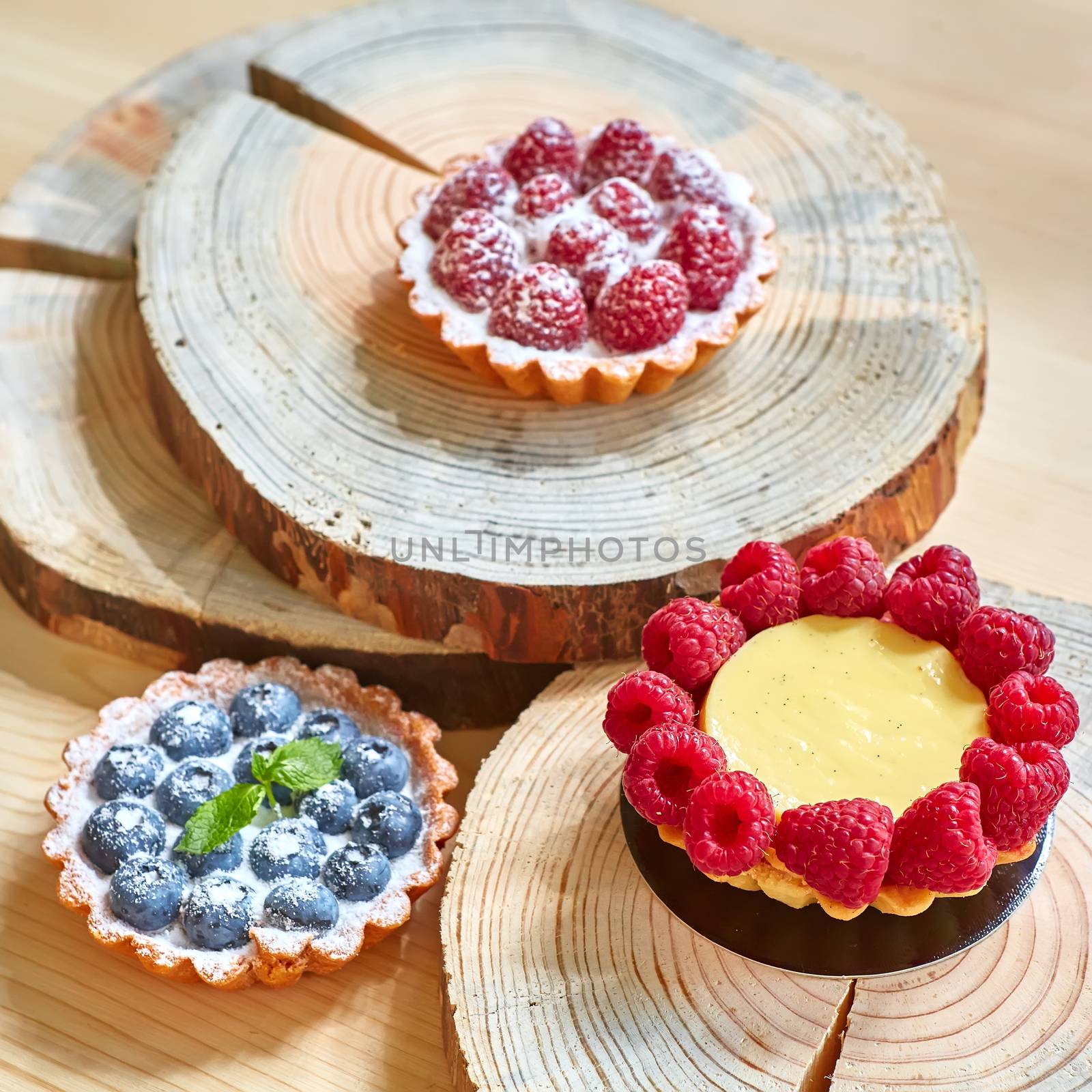 fruit tartlets with raspberries and blueberries  by sarymsakov