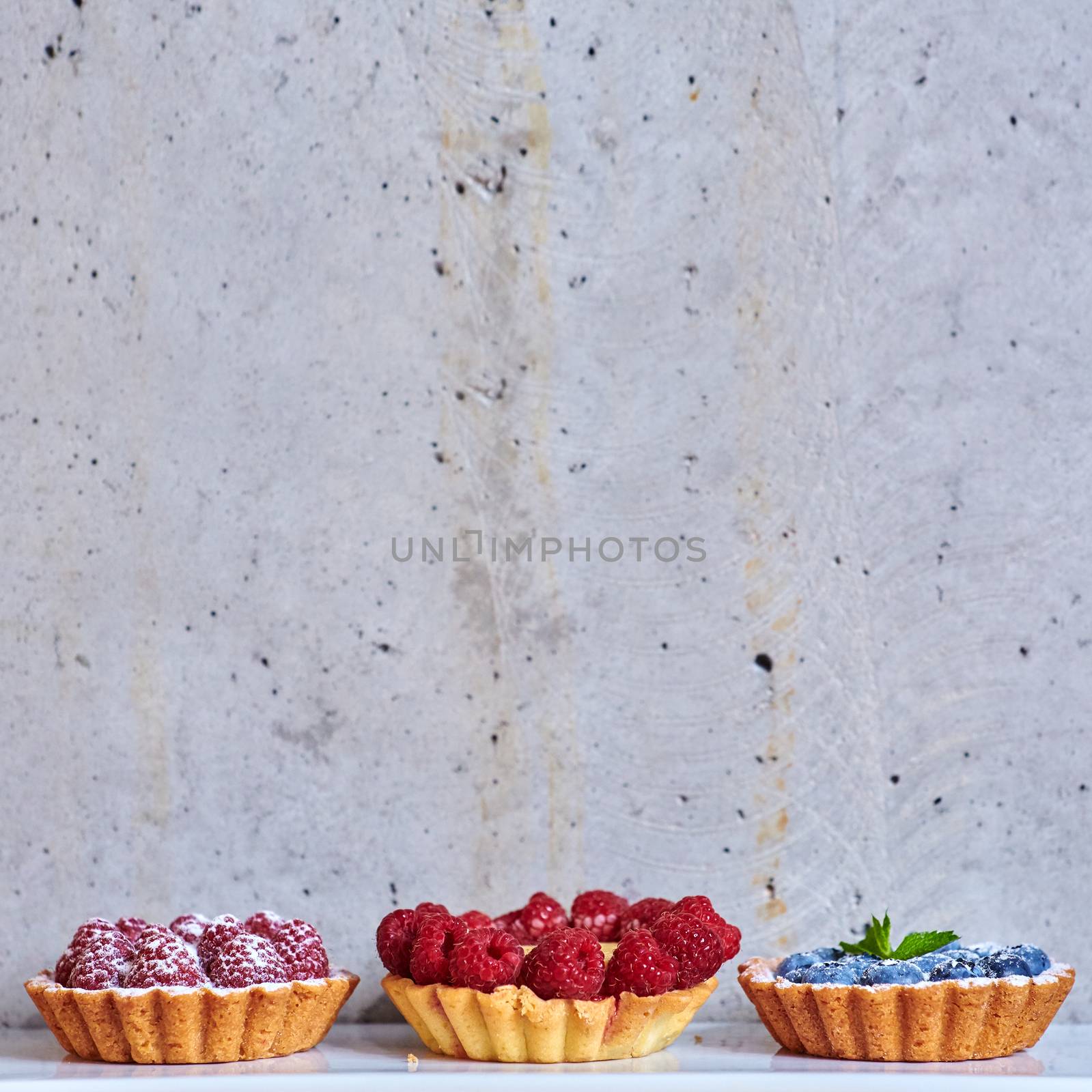 fruit tartlets with raspberries and blueberries  by sarymsakov