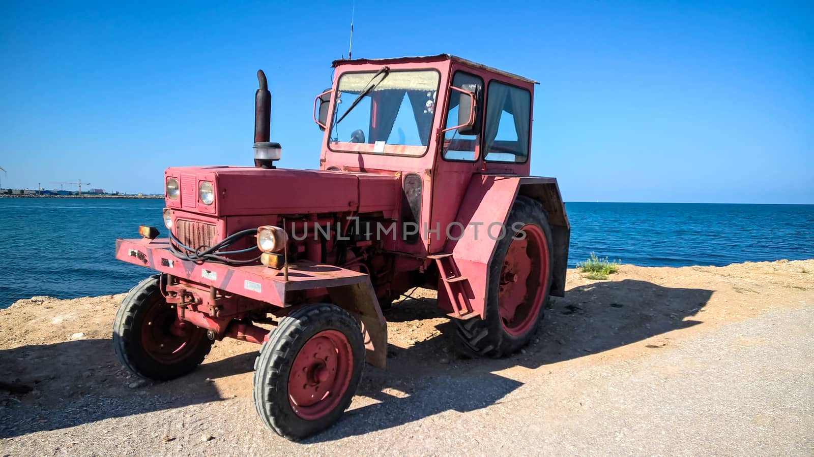 Image that captures a tractor placed near the Black Sea