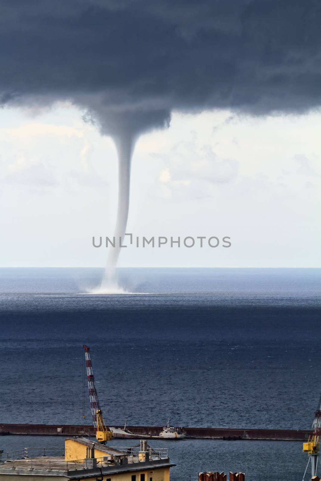 Huge waterspout over the port of Genova, Italy