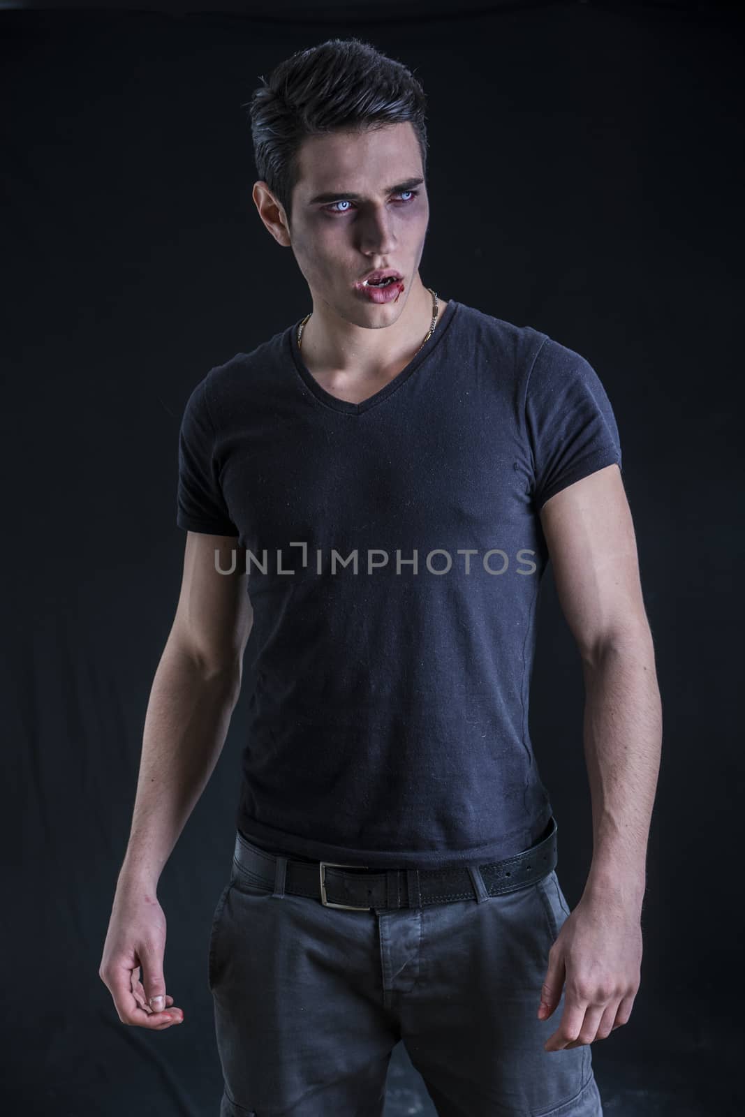 Portrait of a Young Vampire Man with Black T-Shirt by artofphoto