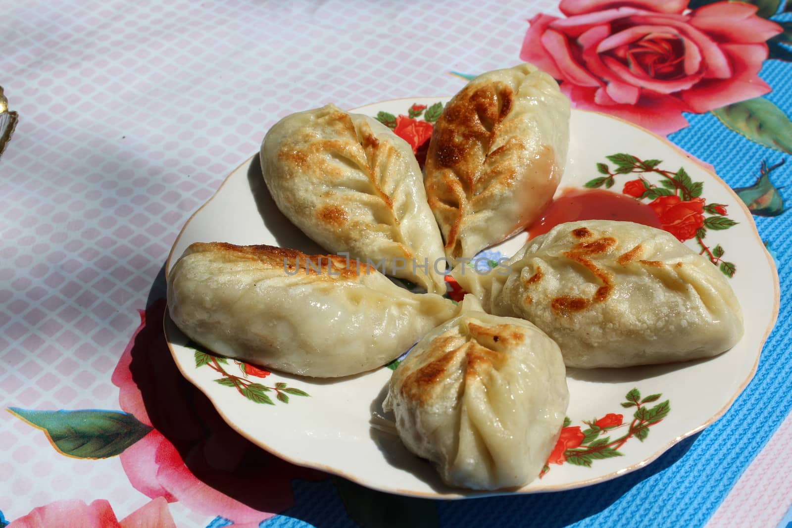 Asian national food (Fried manty). As it is cooked in Kyrgyzstan.