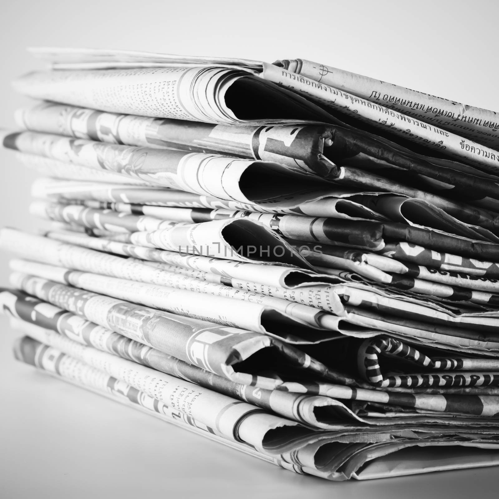 black and white stack of newspaper black and white color tone style