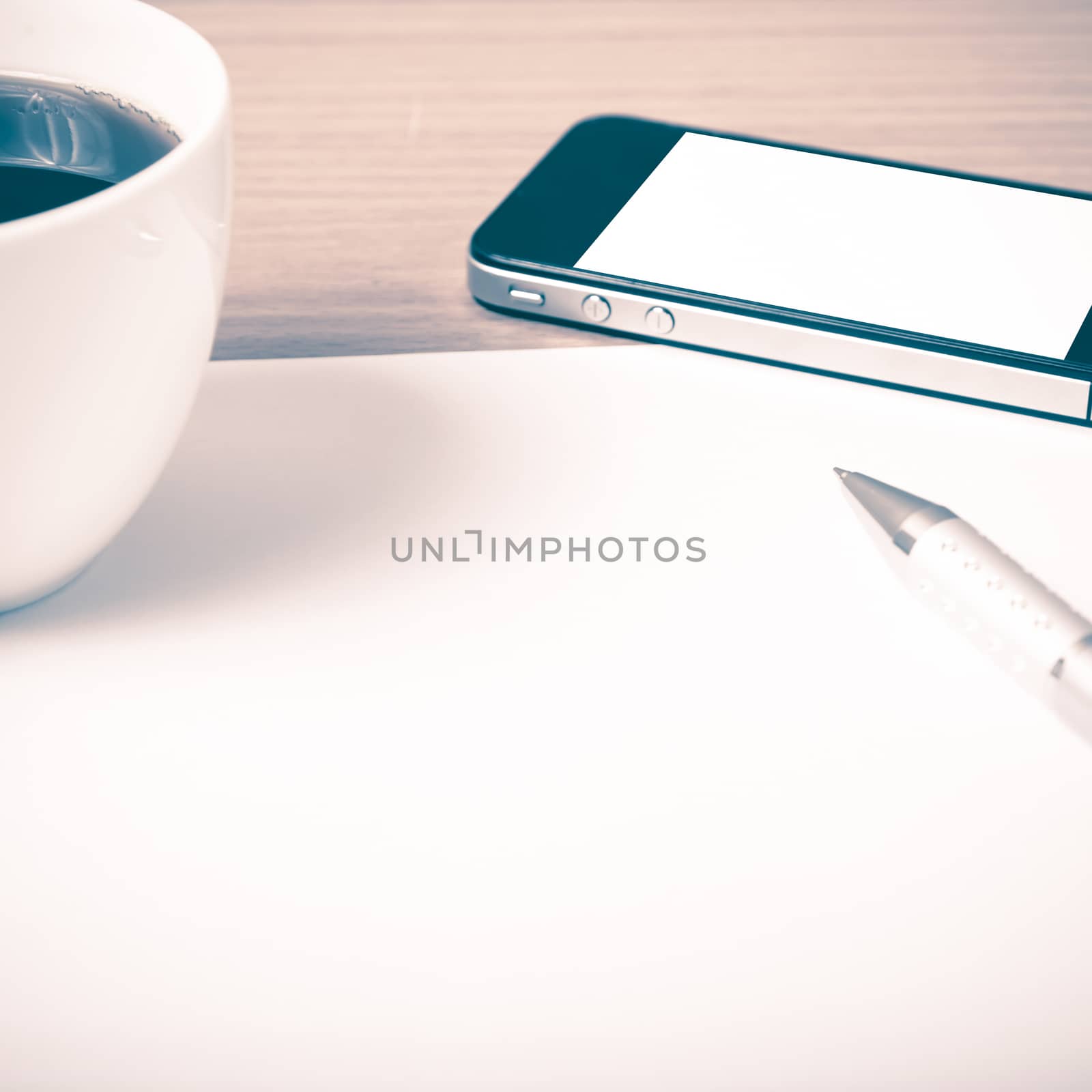 paper and pen with coffee cup and smart phone vintage style by ammza12