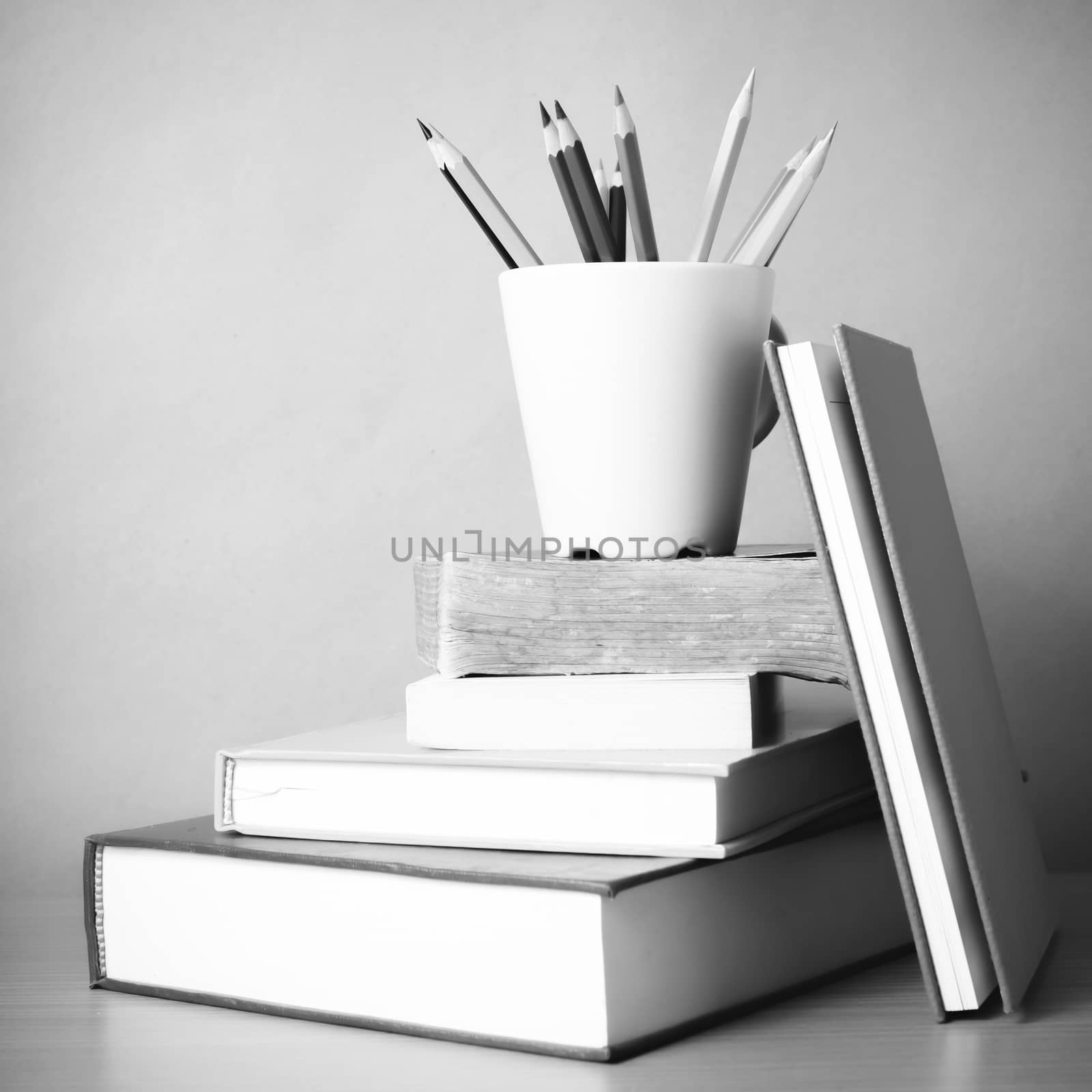 stack of book with color pencil black and white color tone style by ammza12