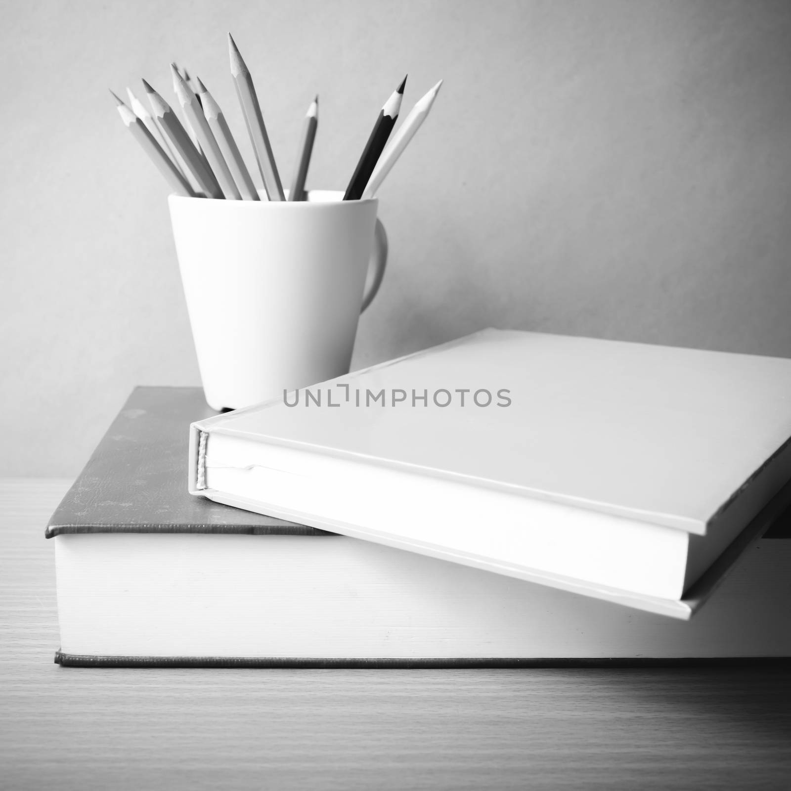 stack of book with color pencil black and white color tone style by ammza12