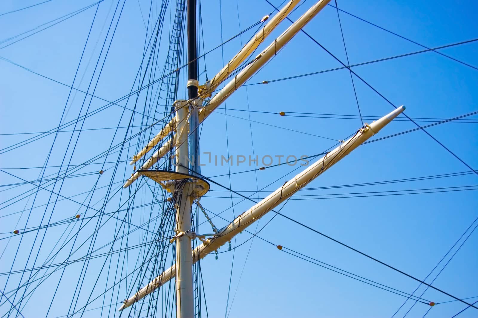 Shipping. Sails against the blue summer sky.