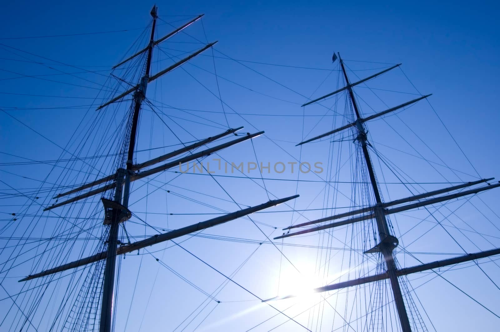 Shipping. Sails against the blue summer sky.