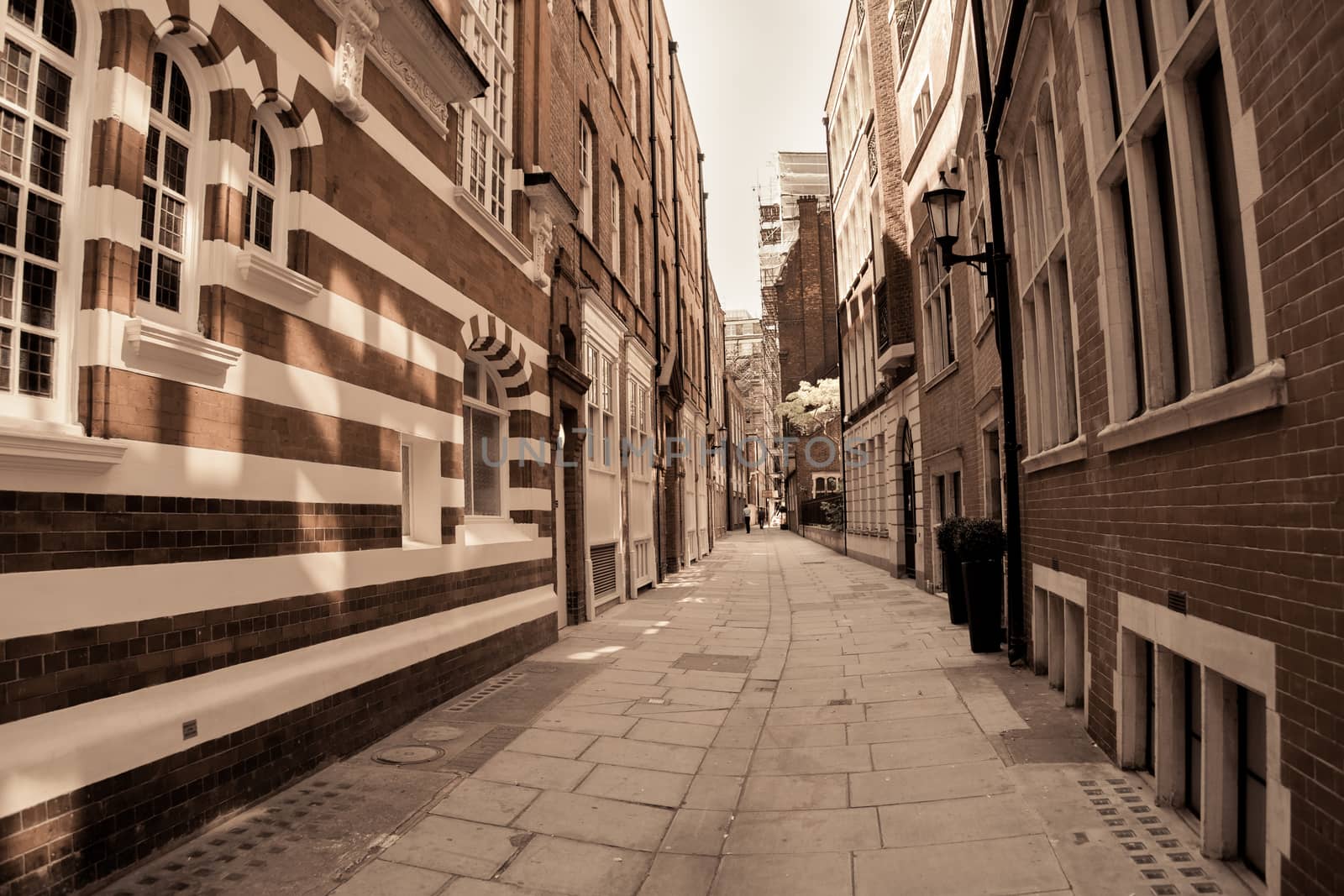 Shadows and light, stipes and brick architecture