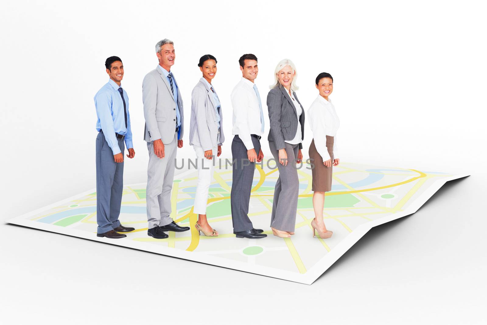 Composite image of business people looking at camera  by Wavebreakmedia