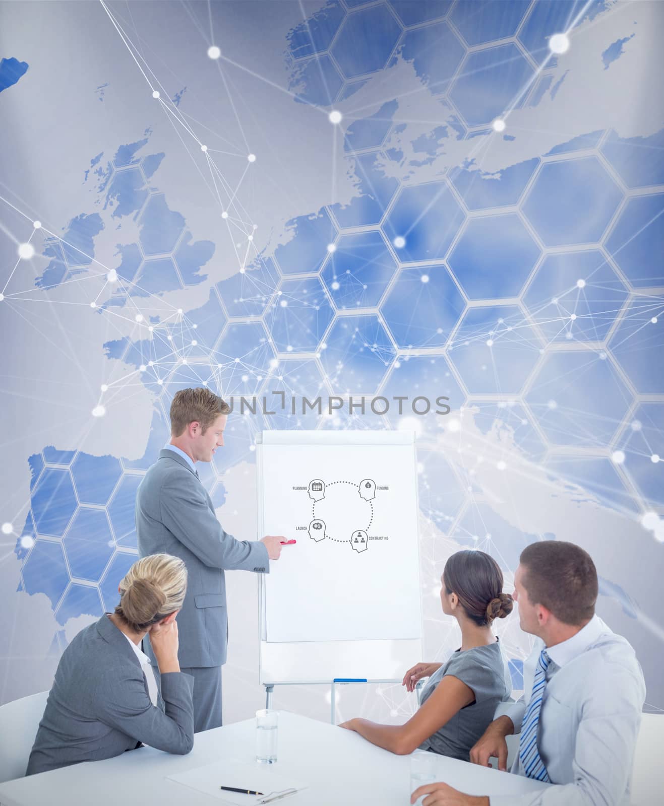 Composite image of manager presenting whiteboard to his colleagues by Wavebreakmedia