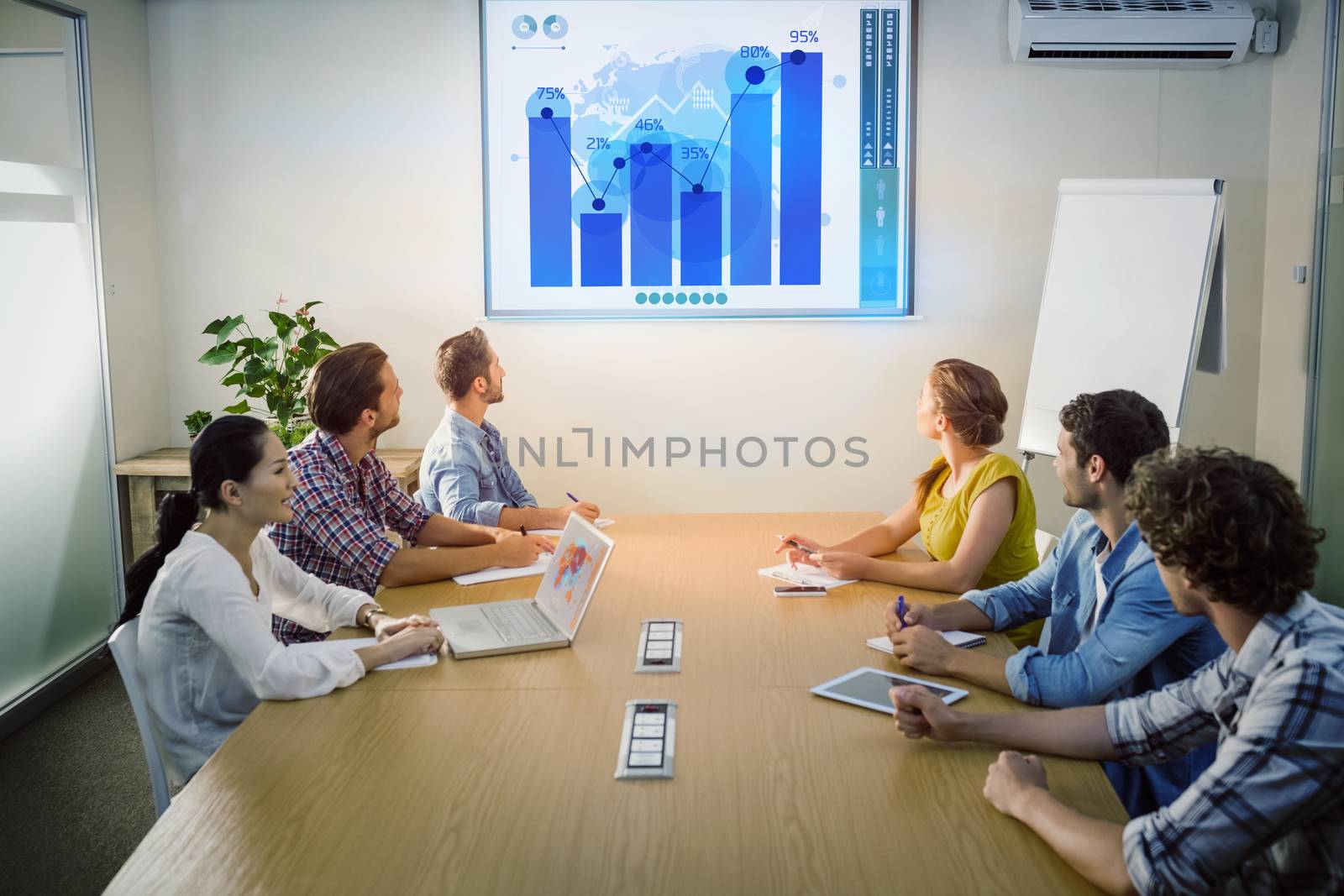 Business interface  against attentive business team following a presentation