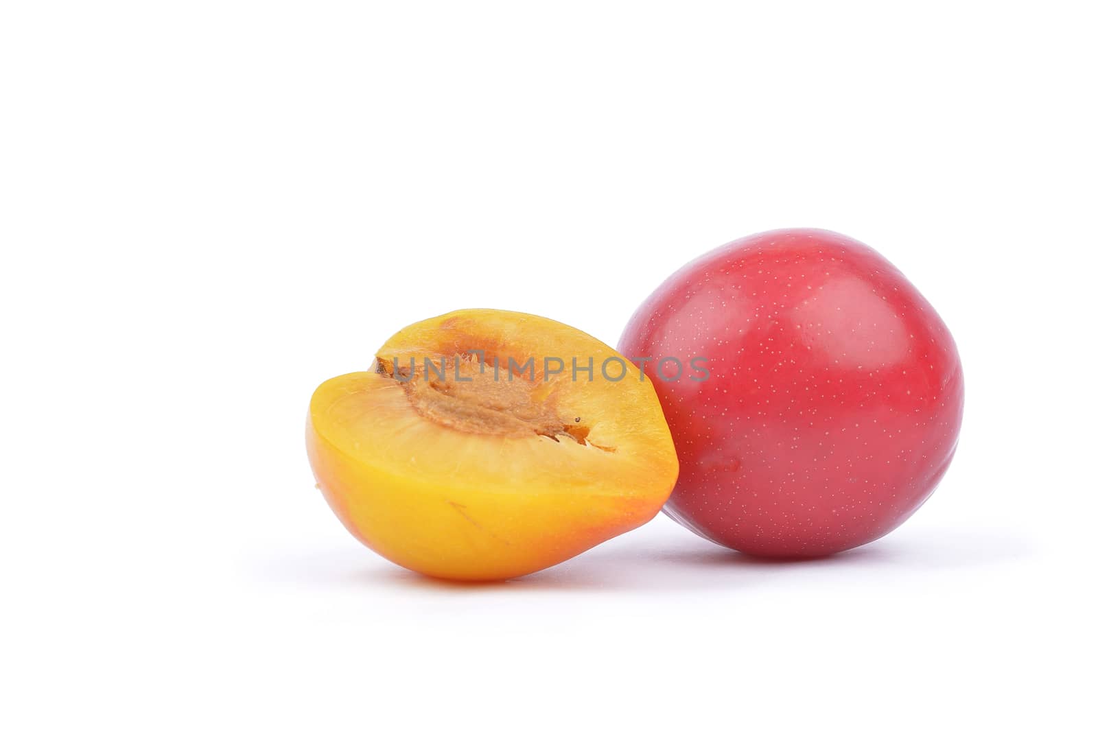 Sweet plum isolated on white background cutout by constantinhurghea
