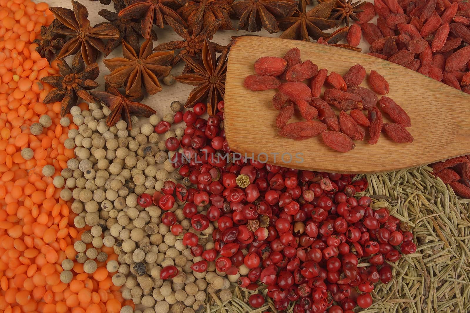 different spices on wooden background. close up