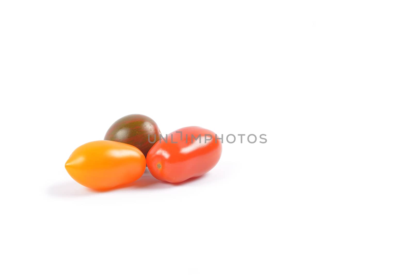 Cherry tomatoes on white background by constantinhurghea