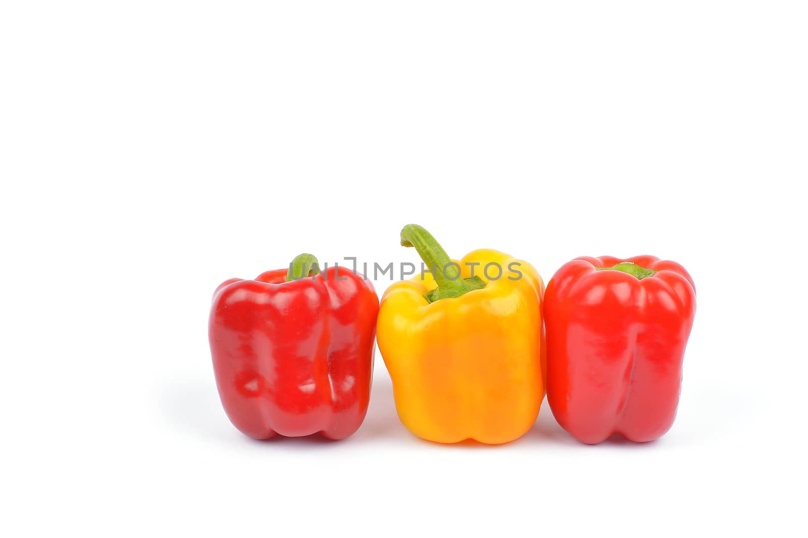 peppers or capsicum on white background by constantinhurghea