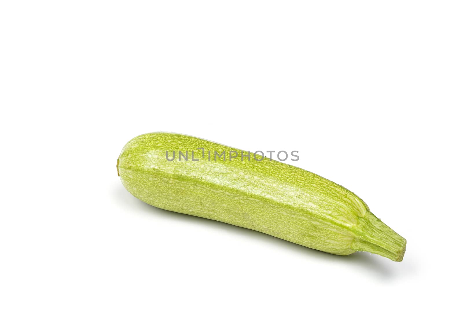 fresh green zucchini  on white background