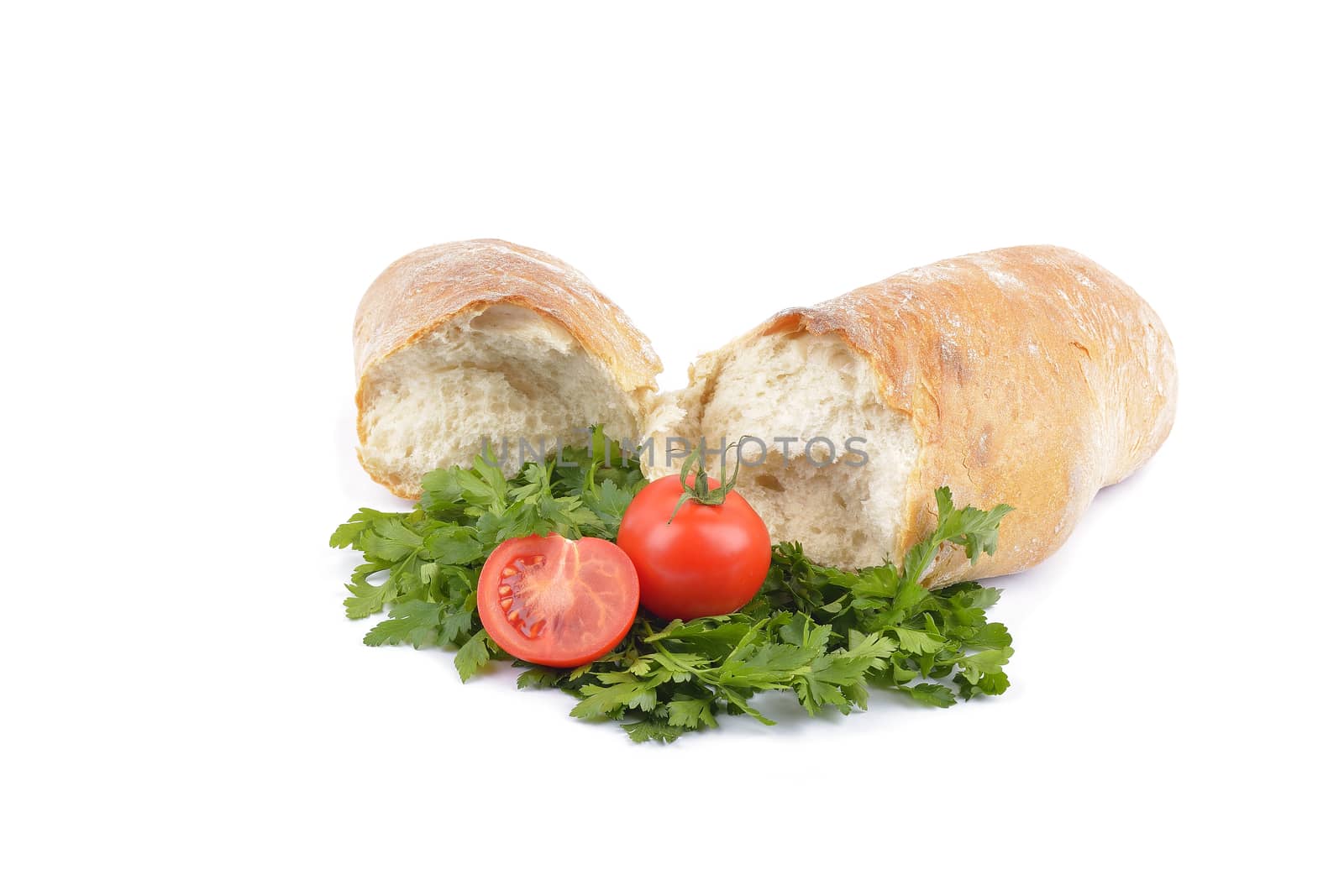 breakfast with fresh baked bread, traditonal salami, cheese and vegetables