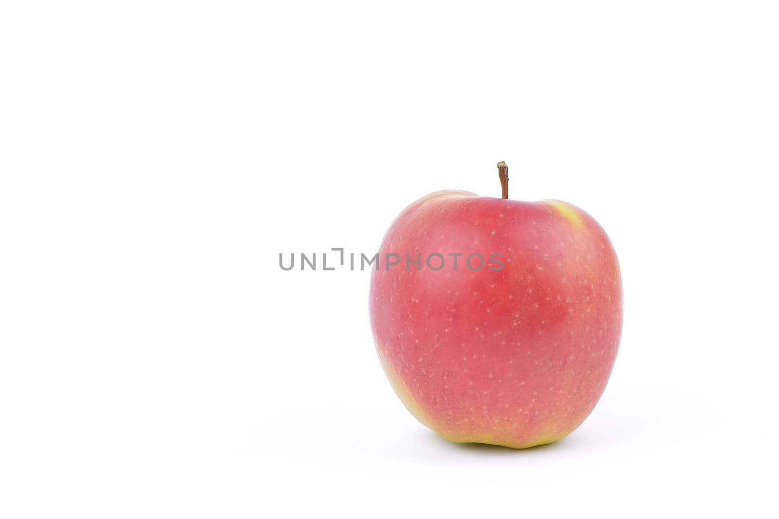 Red apple on a white background.