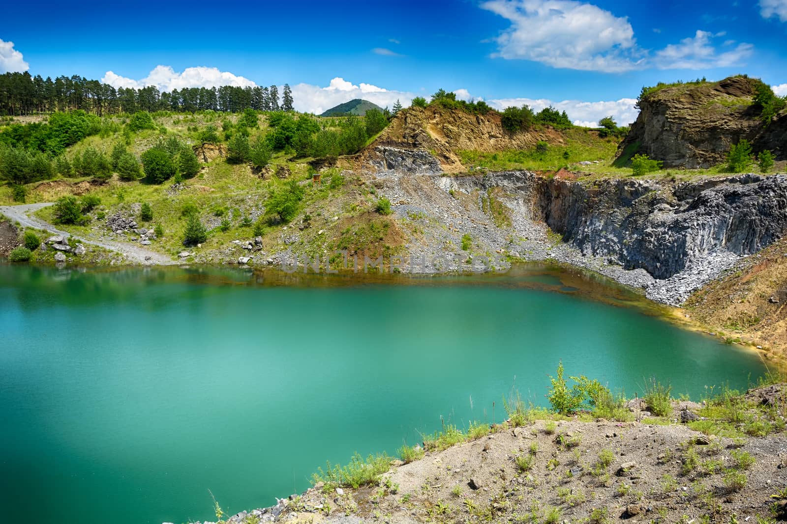 The emerald lake of Racos, Brasov county, Romania