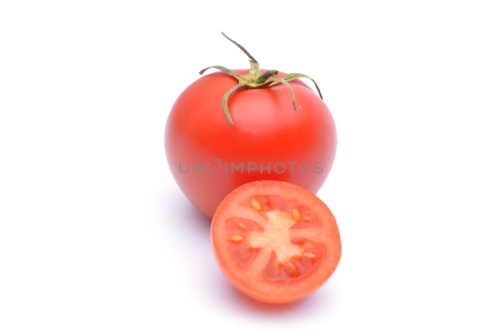 Tomato close-up. isolated on white background by constantinhurghea