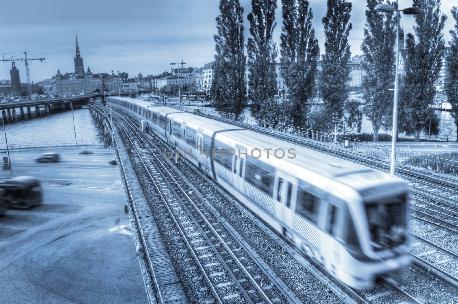 Transportation conceptual image. A speeding train on rails in Stockholm.