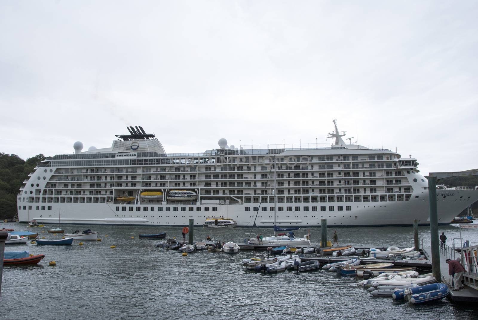 FOWEY,CORNWALL/UNITED KINGDOM -AUGUST 5th :The World  cruise liner at anchor at Fowey Cornwall United Kingdom on its cruise from Singapore to Antarctica and return.