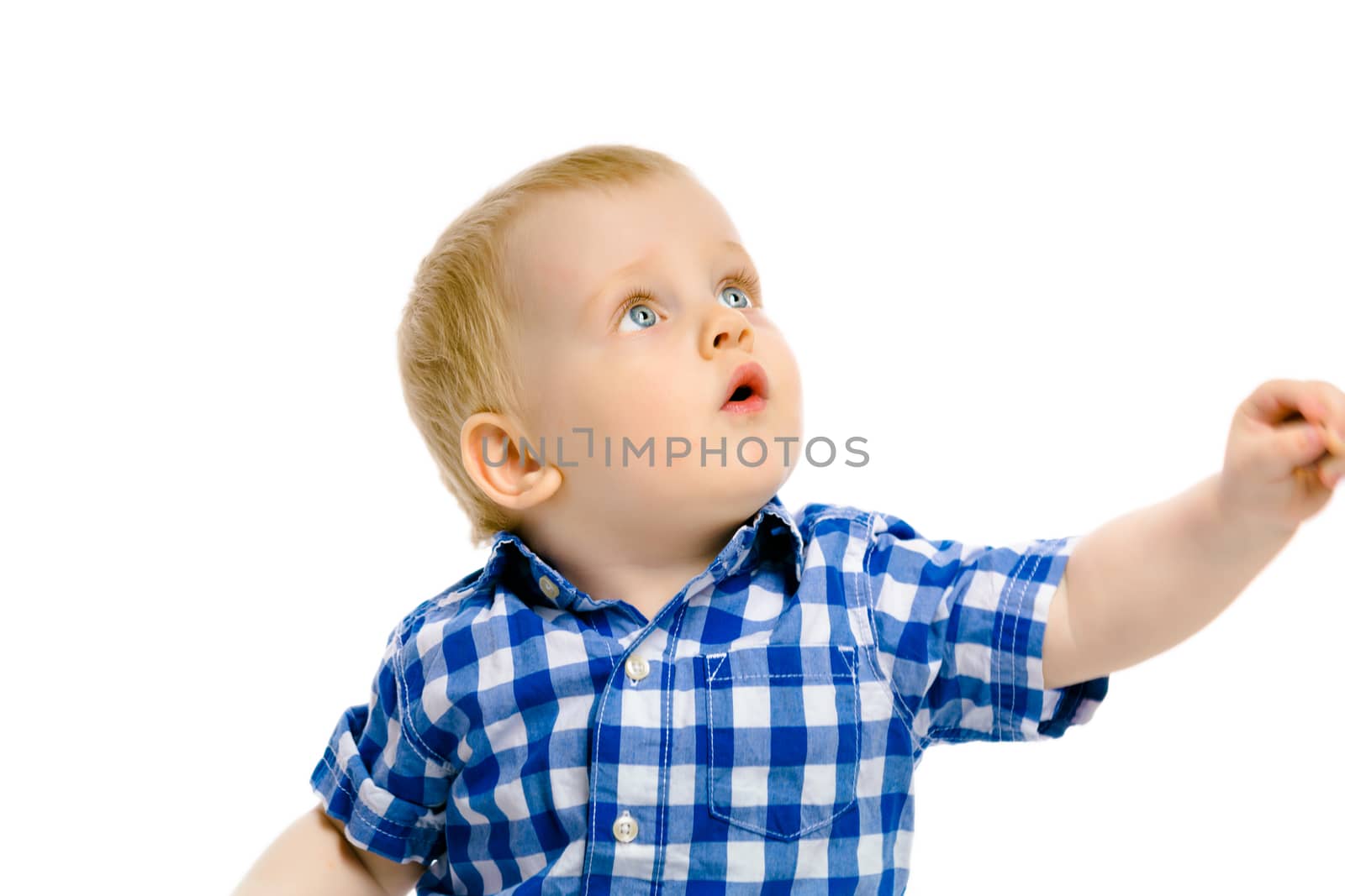 baby boy looking up on a white background
