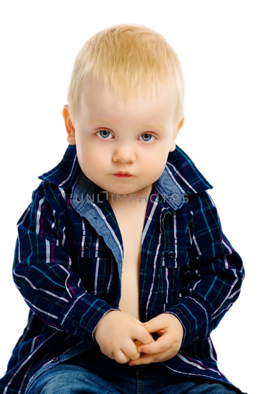 baby boy sitting on a white background