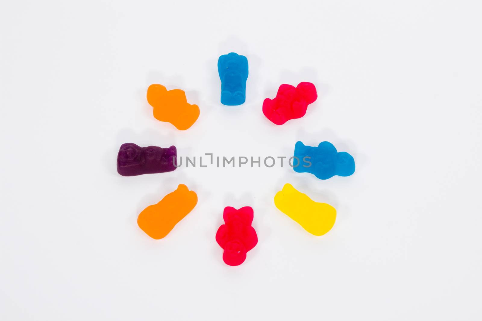 A group of jelly baby athletes performing synchronized swimming.