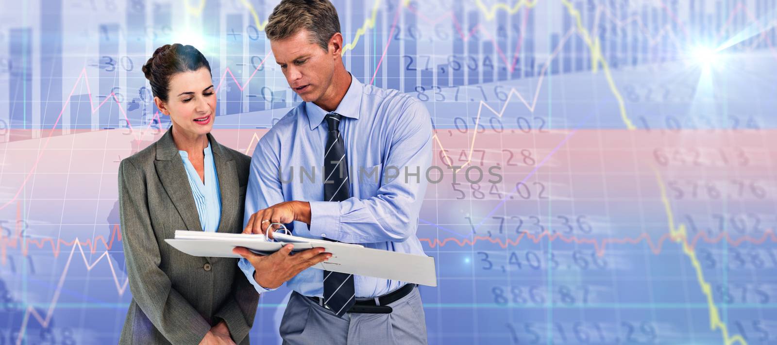 Composite image of business team looking at folder by Wavebreakmedia